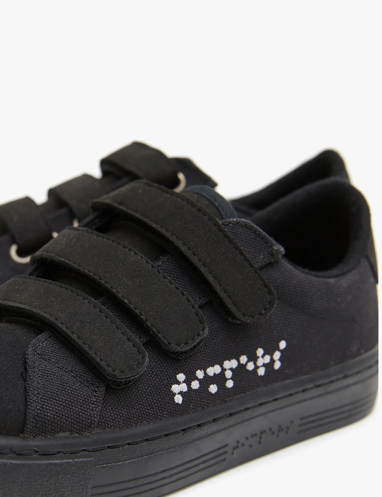 Velcro Black - Timpers Tejido de lona de color negro con tres tiras de velcro. Braille en color blanco.